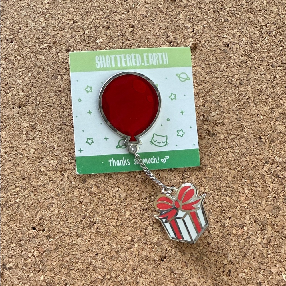 Animal Crossing balloon present enamel pin